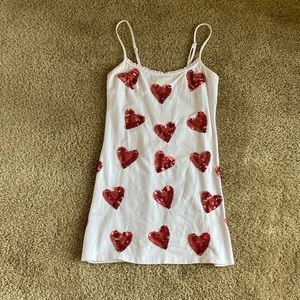 white adjustable dress with sequin hearts.